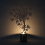 Adam-Frank-Lumen-Flame-the-stainless-steel-shadow-projector-and-nightlight-1