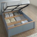 Grey wood storage bed