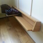 Wall mounted shoe rack from Pax door