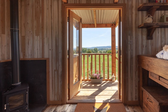 interior of dunmore at huts in the hills in northumberland 1024 wide - Charming Shepherd's Hut Boasts an Ingenious Bed With Built-in Dining Table