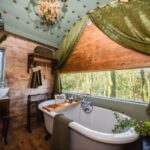 relax-and-soak-in-the-roll-top-bath-tub-looking-out-over-cumbria-inside-faraway-treehouse