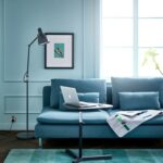 a-blue-living-room-with-a-sofa-and-adjustable-laptop-stand-f-536a040bbea2573932422f558ab86f8c