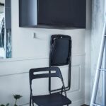 hang-folding-chairs-on-wall