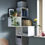 open-wall-storage-units-in-a-corner-of-a-grey-room