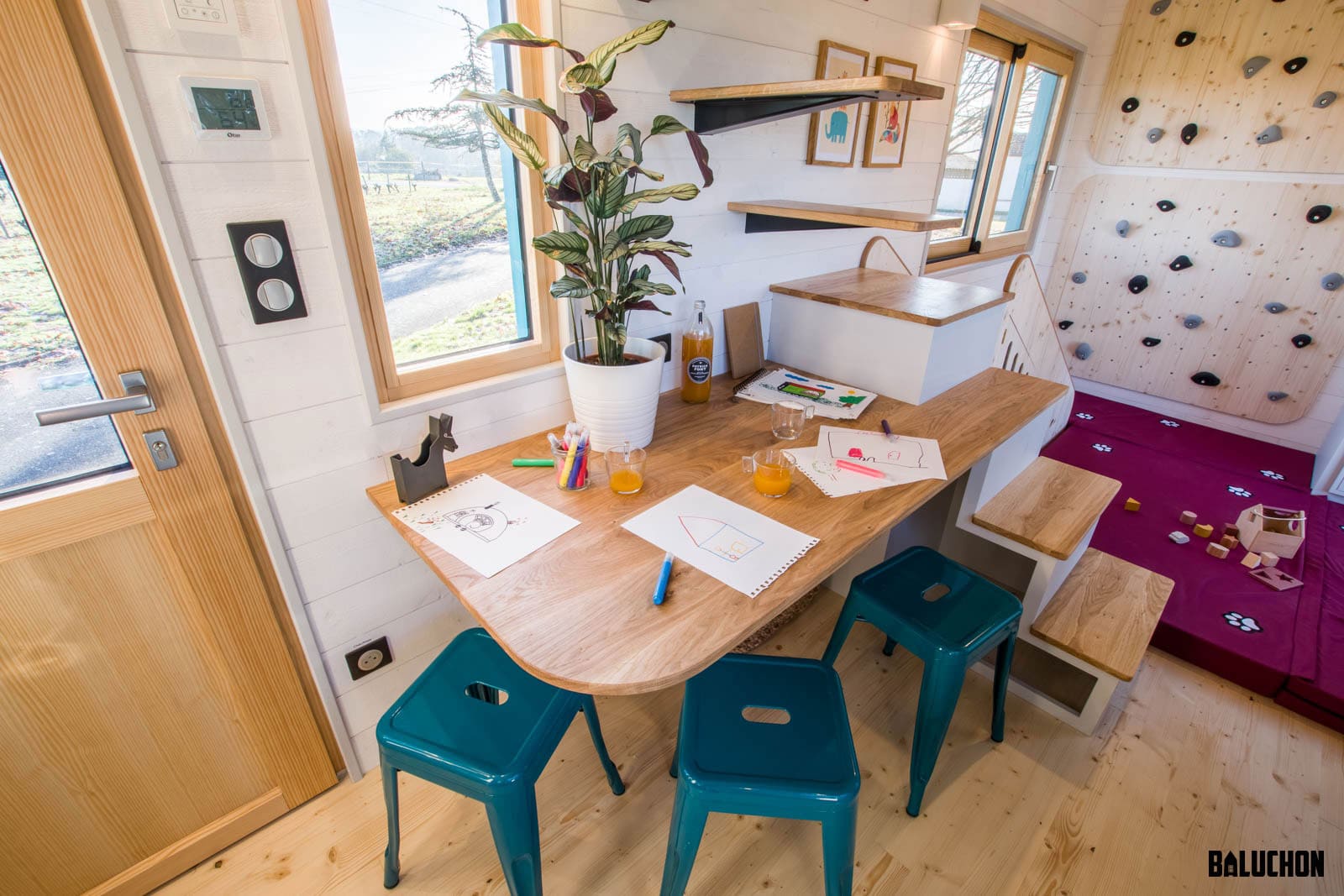 tiny house maison bonheur 25 - Tiny House Mom Acquires Second Tiny Home for Daughter, Complete with Climbing Wall, Slide, and Secret Nook