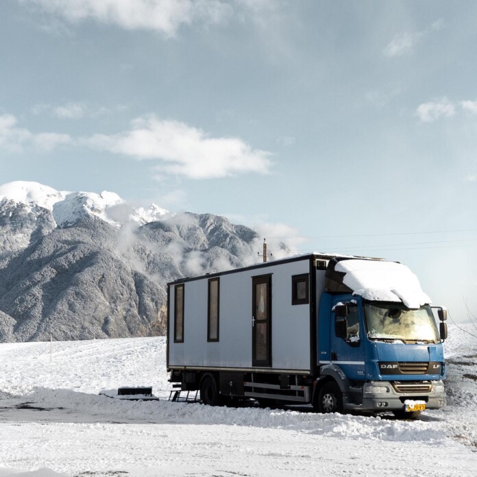 Nomad Couple Converts Used Truck Into Dreamy Tiny Home With Wall