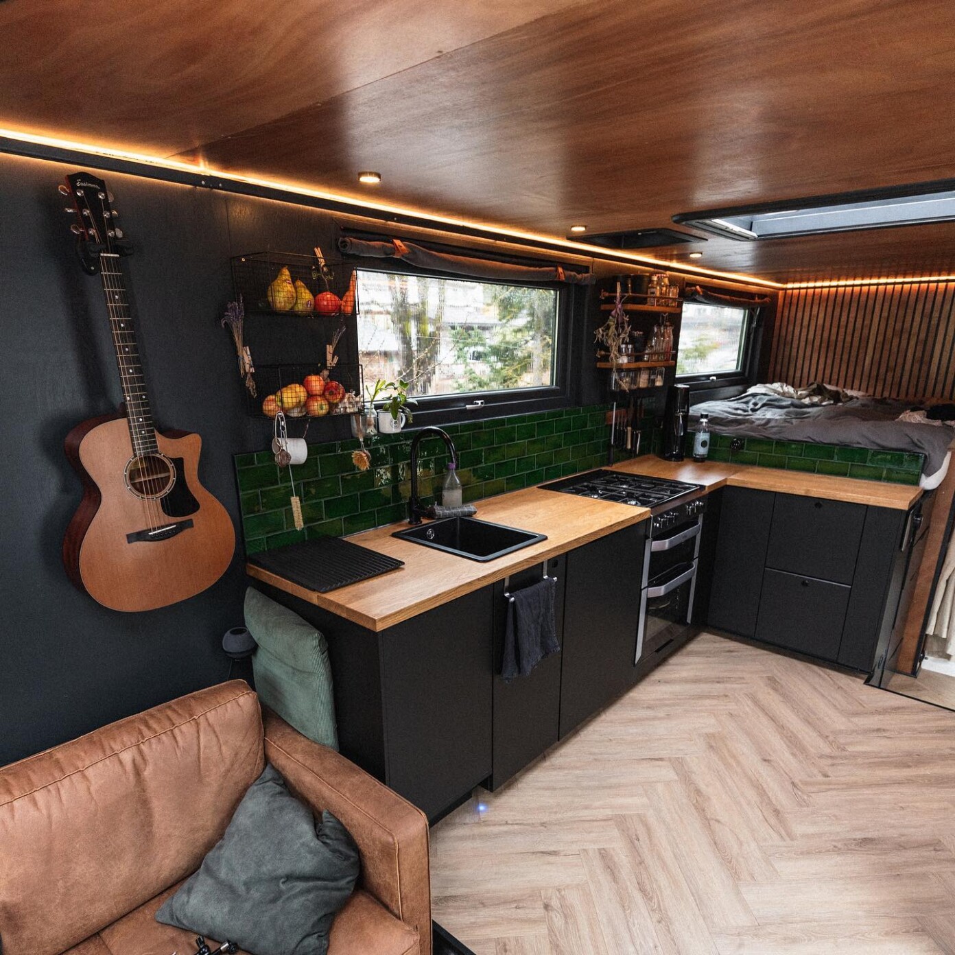 Nomad Couple Converts Used Truck Into Dreamy Tiny Home With Wall