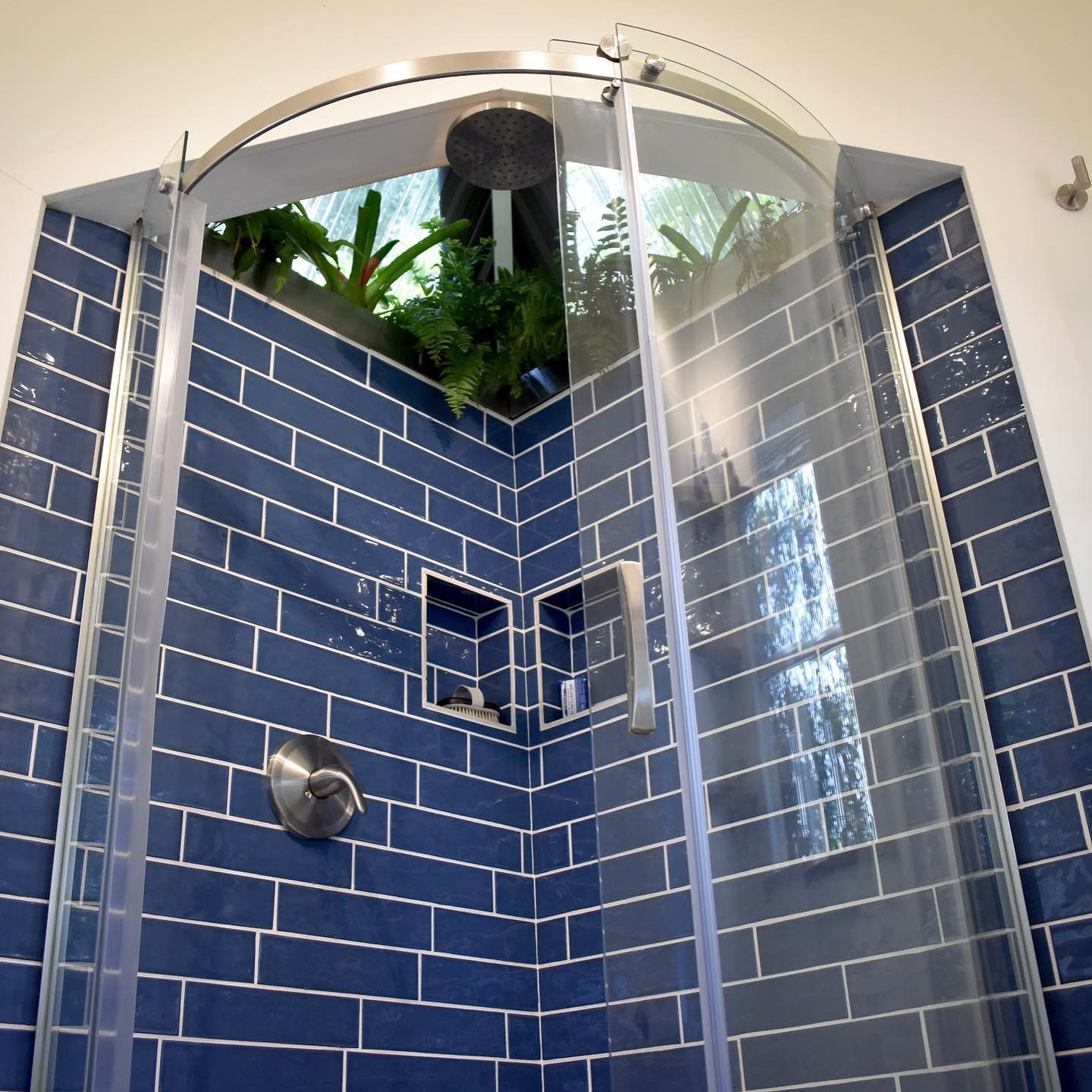 oasis paradise tiny homes 35 - Sleek Tiny House Boasts Enormous Round Window, Outdoor Bar Pass-Through and Shower With Dome Skylight