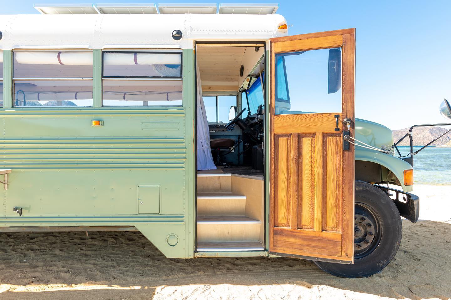 queen beep bus conversion 6 - From Scraps to Sanctuary: How a Couple Turned a $7,200 School Bus Into a House on Wheels Using Recycled Materials