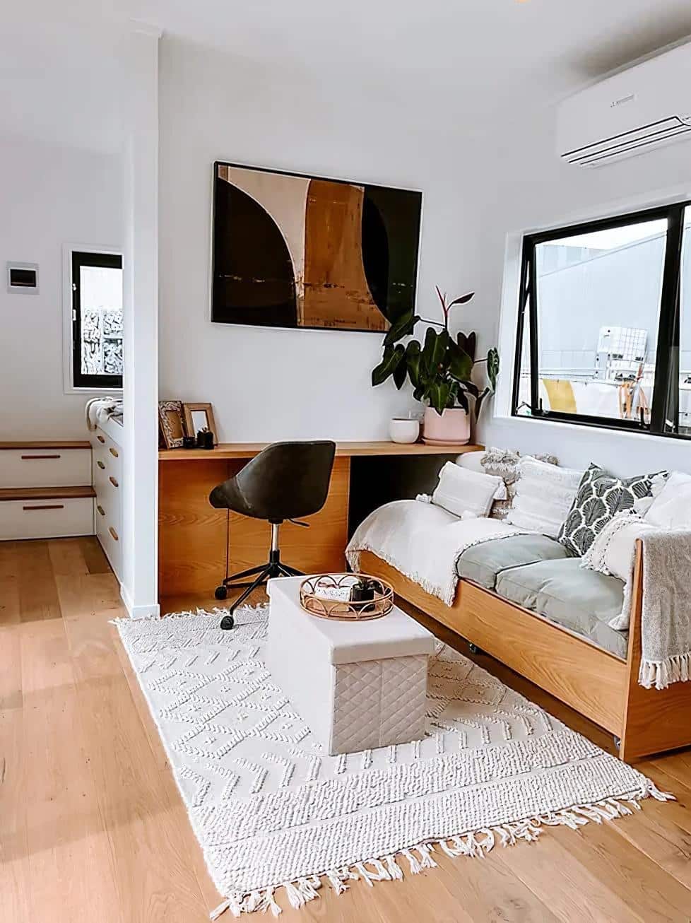 steph shayes tiny homes 13 - A Life Less Lofted: This Sleek Tiny Home Offers Single-Level Living and Clever Hidden Sofas
