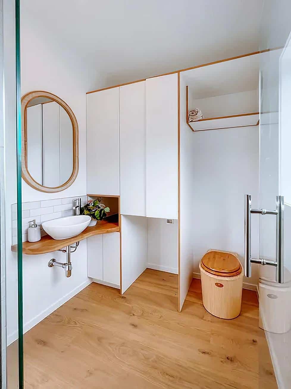 steph shayes tiny homes 14 - A Life Less Lofted: This Sleek Tiny Home Offers Single-Level Living and Clever Hidden Sofas
