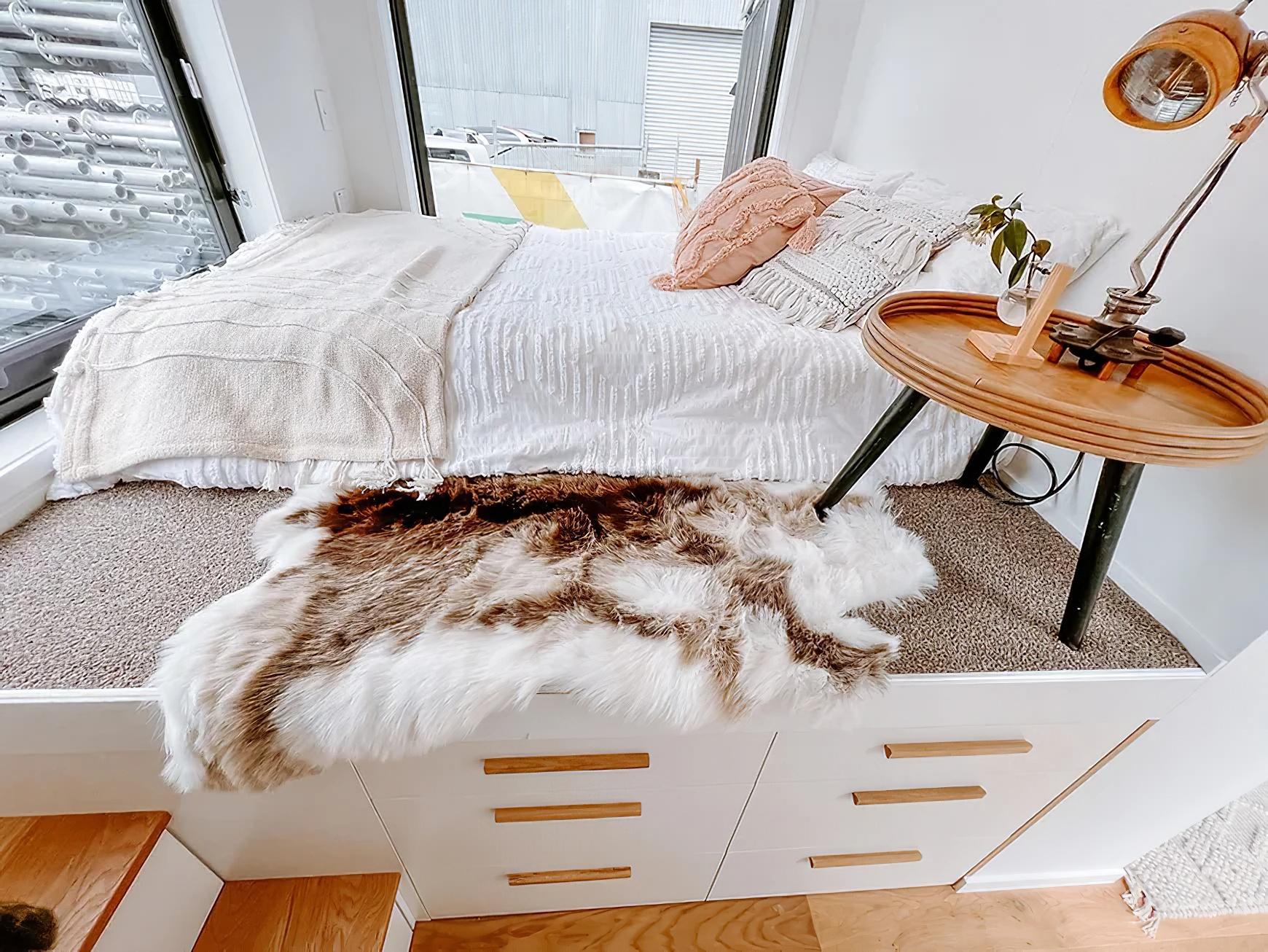 steph shayes tiny homes 2 - A Life Less Lofted: This Sleek Tiny Home Offers Single-Level Living and Clever Hidden Sofas