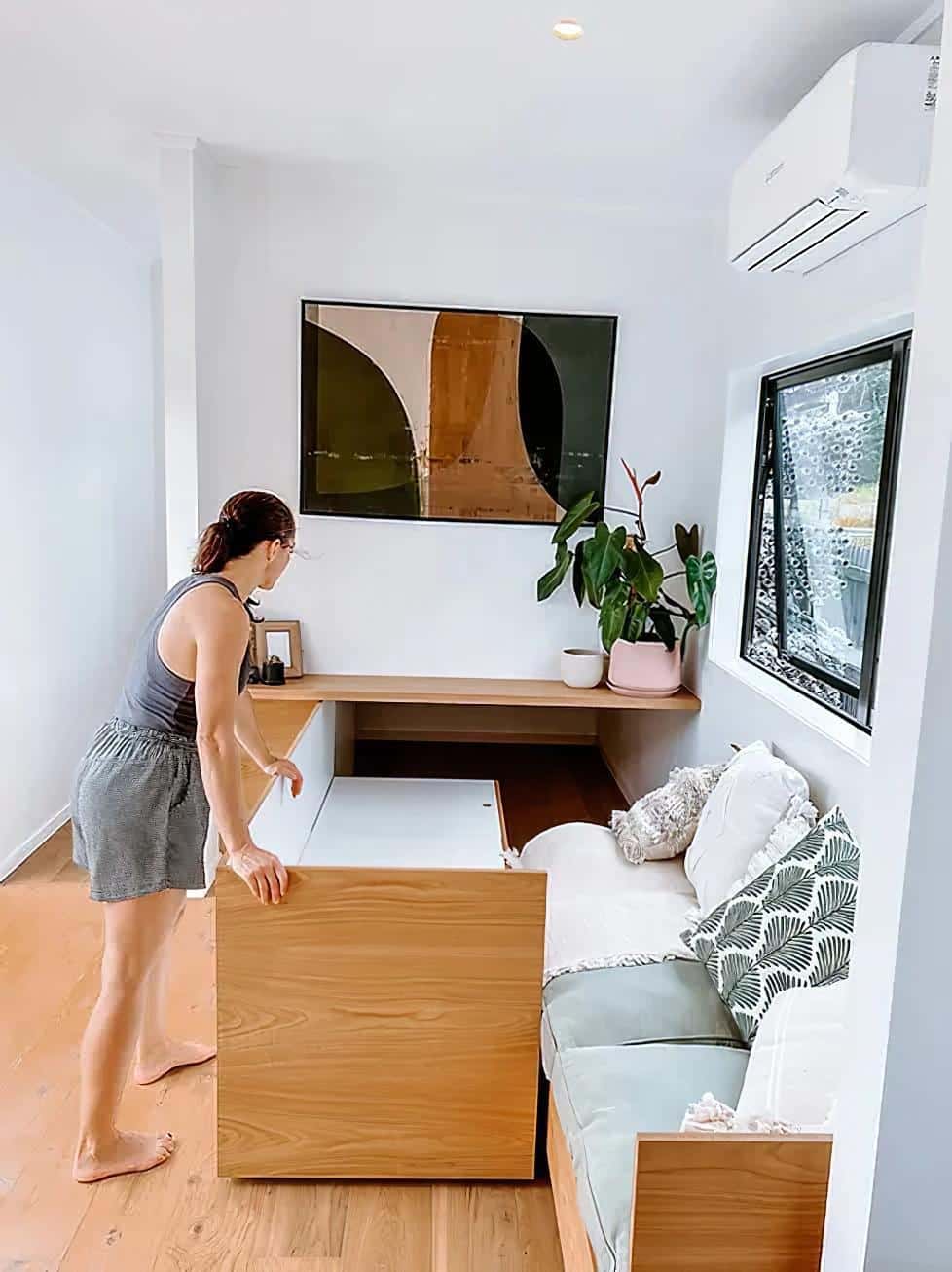 steph shayes tiny homes 8 - A Life Less Lofted: This Sleek Tiny Home Offers Single-Level Living and Clever Hidden Sofas