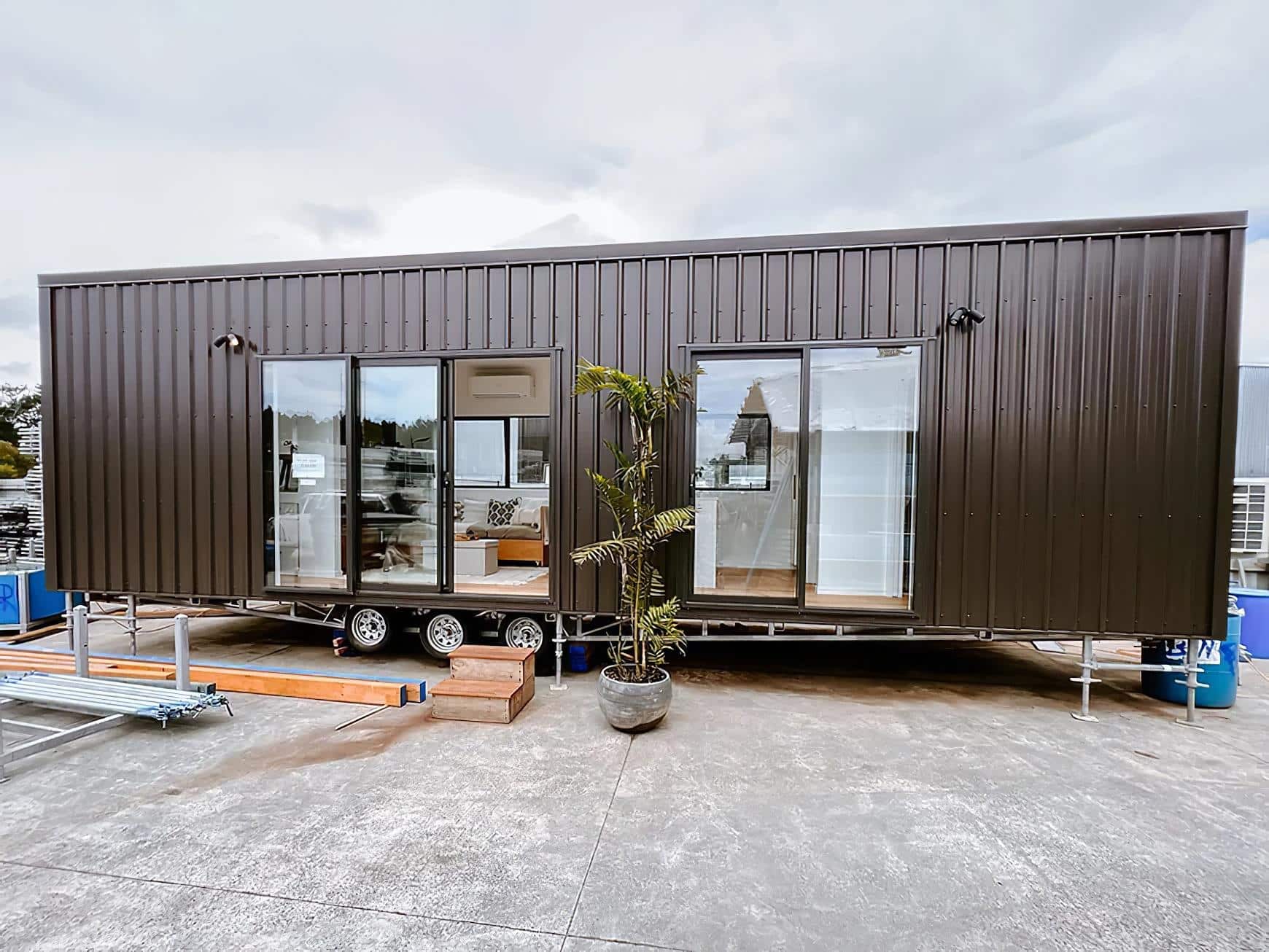 steph shayes tiny homes 9 - A Life Less Lofted: This Sleek Tiny Home Offers Single-Level Living and Clever Hidden Sofas