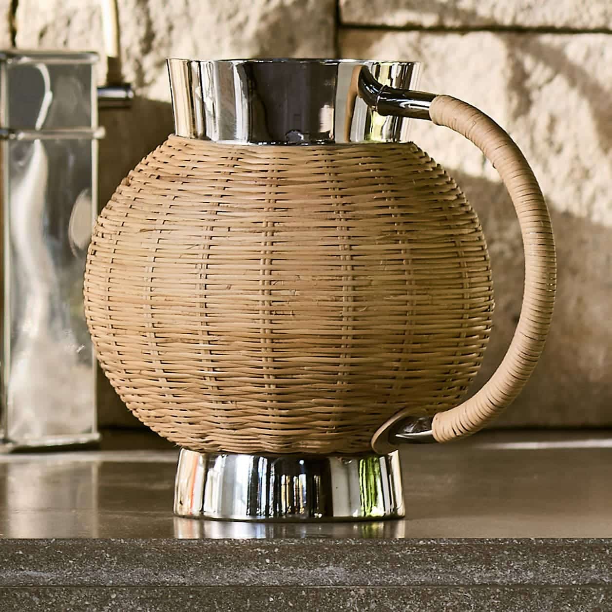 Romsey 67 Oz. Wicker Metal Pitcher by Jake Arnold - Coastal Charm Meets Old Hollywood in Jake Arnold’s Latest Crate & Barrel Collections