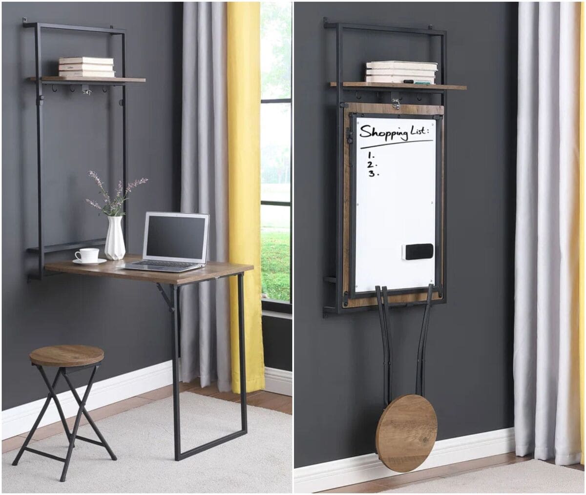 A compact foldable wall desk is shown in two positions: open with a laptop, vase, and stool, and closed with the desk folded up, revealing a whiteboard and storage shelf above. The setup is against a dark wall by a window.