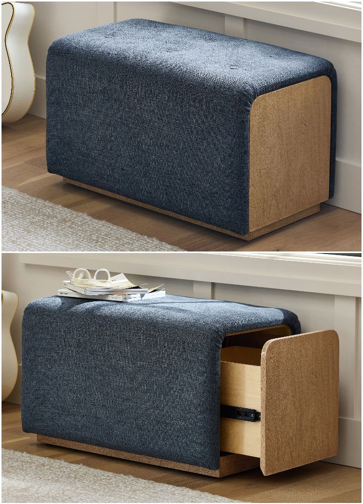A blue fabric ottoman with wooden sides is shown closed in the top image and open in the bottom image, revealing a pull-out wooden storage drawer. It sits on a light wooden floor near a white wall.
